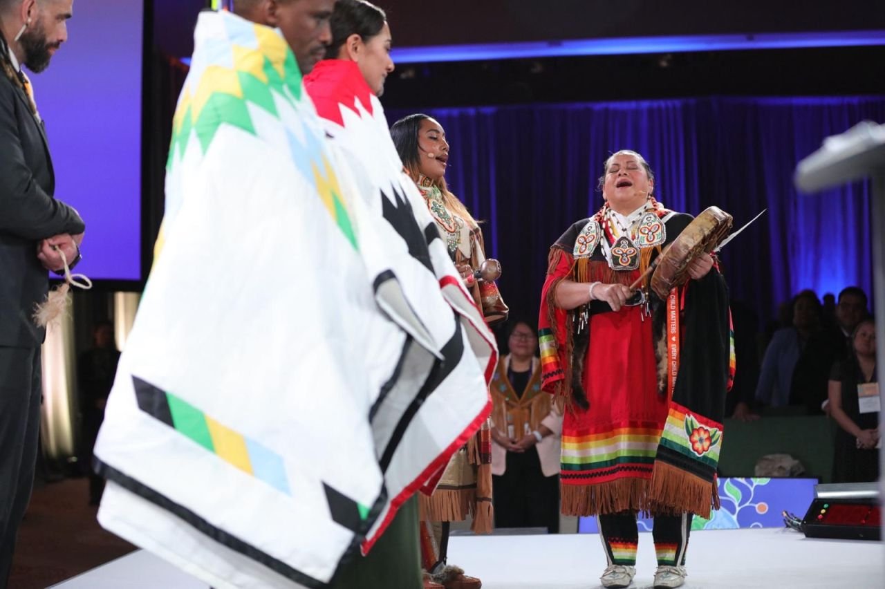 Ceremonial moment on stage at the First Nations Major Projects Coalition conference