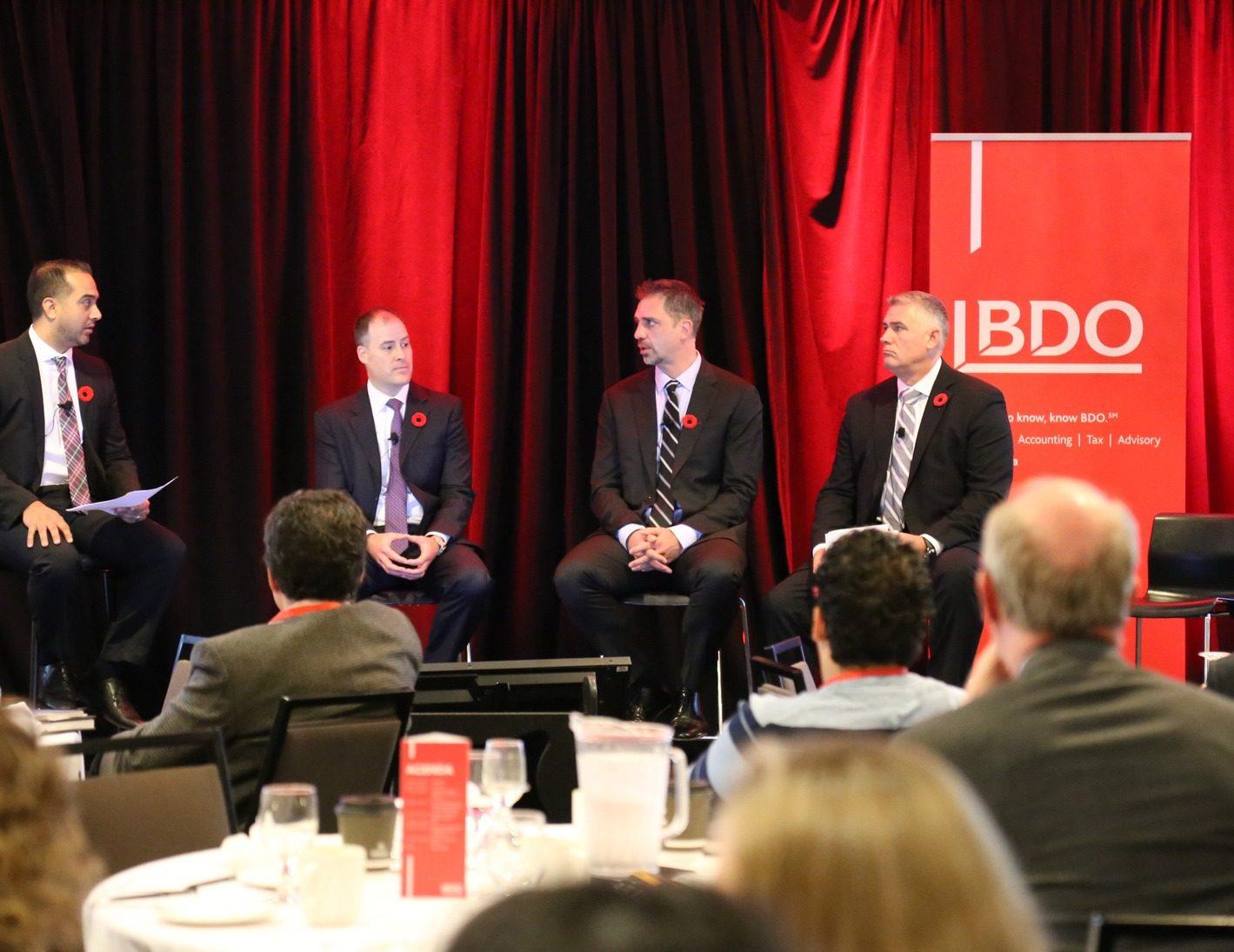Panel discussion on stage at BDO's Real Estate Conference